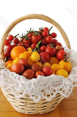 Different varieties of tomatoes in a basket