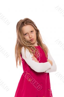Young girl making face