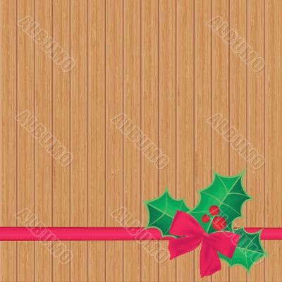 Christmas background with holly berry leaves on dark green background