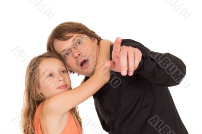 Father showing something to his daughter