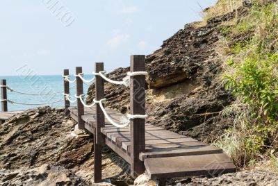 Wooden footbridge near the sea   