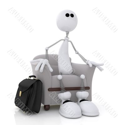 The little white man sits in a chair.