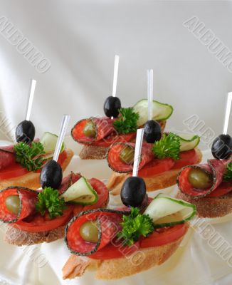 CanapÃ©s with salami