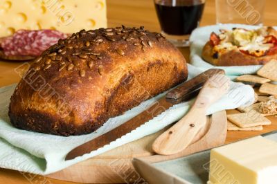 Bread, salami, cheese and wine