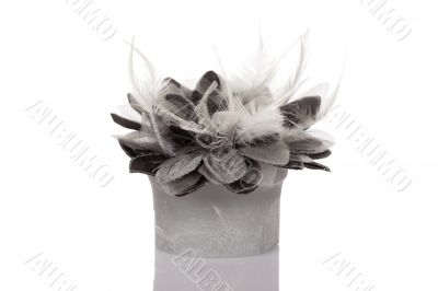 Feathers, beads and candle