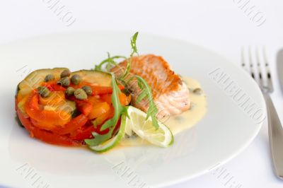 Fish fillet, sauce and vegetables