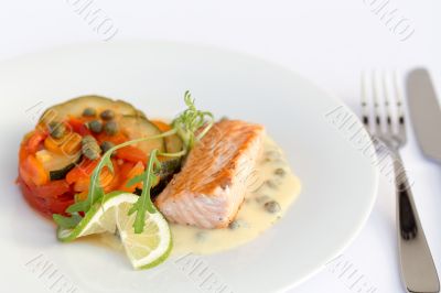 Fish fillet, sauce and vegetables
