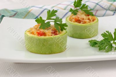 Zucchini stuffed with vegetables and cheese