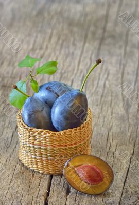 basket with plums