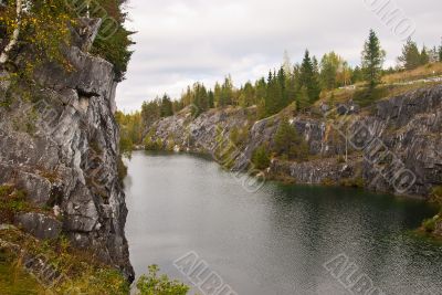 Forest lake in the rocks