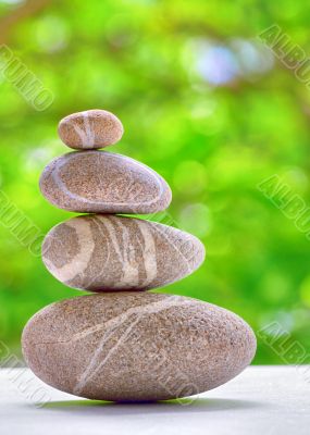 stone pyramid over natural background