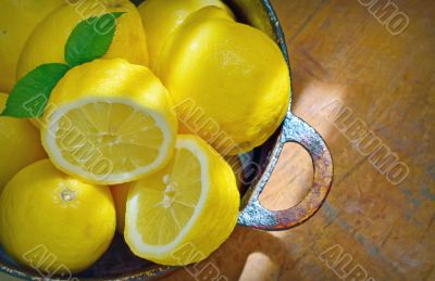 fresh lemons on a wood table