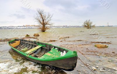 green boat on danube river