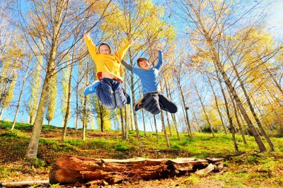 two boys jumping