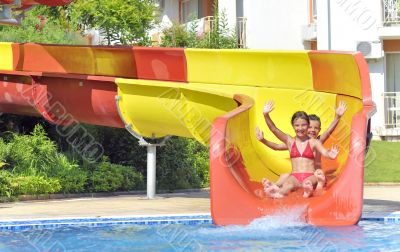 Children on water slide