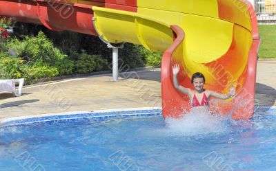 girl in the pool water slide 