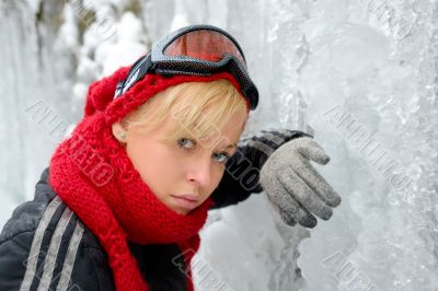 a winter portrait of a beautiful blonde girl