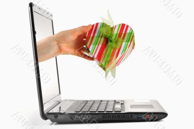gift come out from a screen of a laptop 