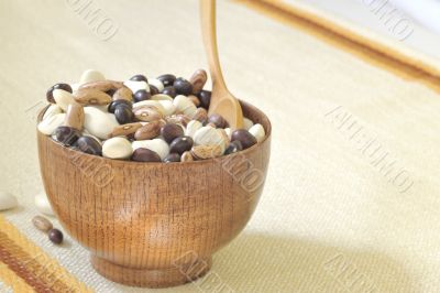 colored beans in wooden bowl