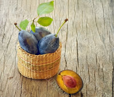 plums in the basket