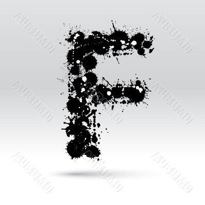 Letter F formed by inkblots