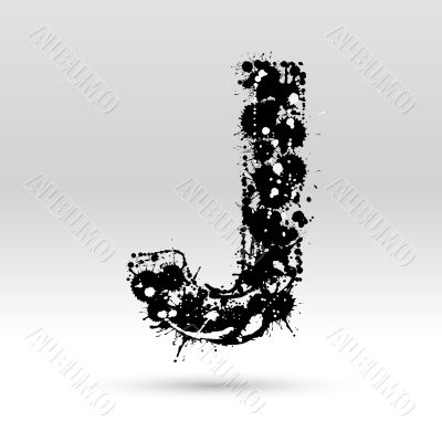 Letter J formed by inkblots