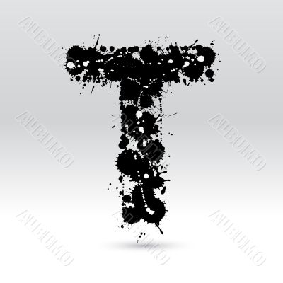 Letter T formed by inkblots