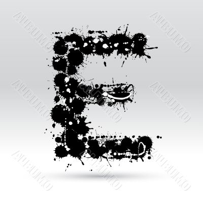 Letter E formed by inkblots