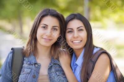 Young Adult Mixed Race Twin Sisters Portrait Outside
