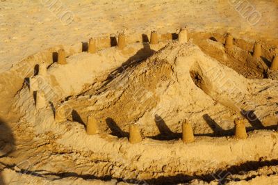 The castle and the fortress wall, built children of sand on a be