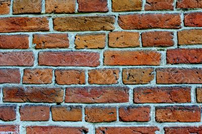 Fragment of a brick wall of an ancient building.