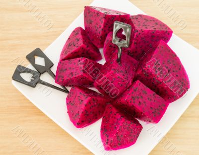 dragon fruits and  slice on plate 