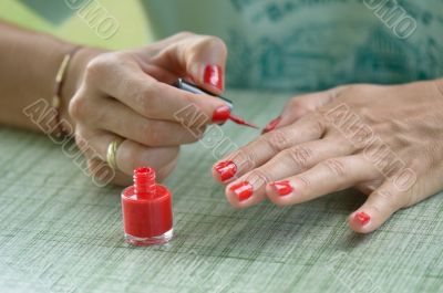 Woman Red Nail Polish