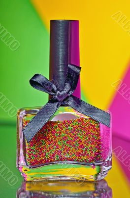 Bottle with colorful nail polish 