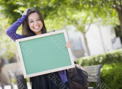 Excited Mixed Race Female Student Holding Blank Chalkboard