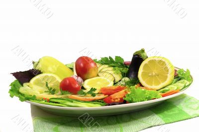 Vegetables and fruit platter. Presented on a white background.