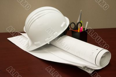  Helmet, drawings and stationery items in office