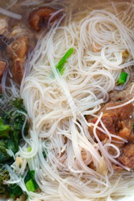 Thai soup with noodles and meat