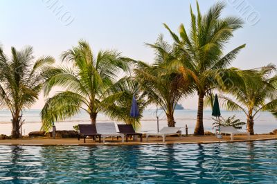 Swimming pool by the sea in Thailand