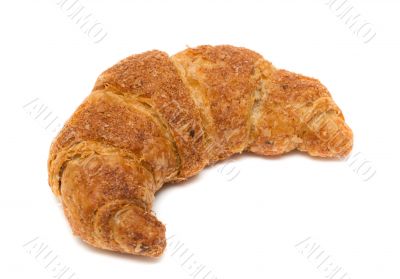 Fresh and tasty croissant over white background