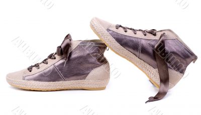 Pair of fashionable sneakers. Isolated on white