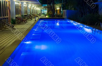 Pool and garden by night