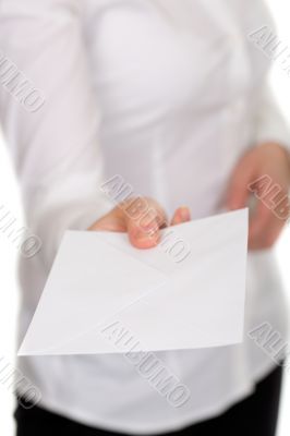 woman gives a white envelope