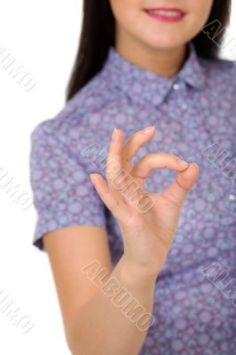 girl showing OK sign