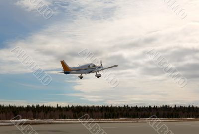 private propeller plane takes off