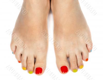 Female feet with a pedicure color