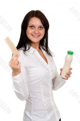 Beautiful girl with yogurt and crackers 