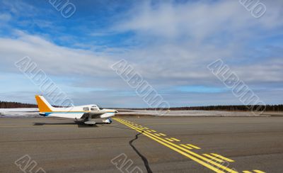 Small airplane in a small airport