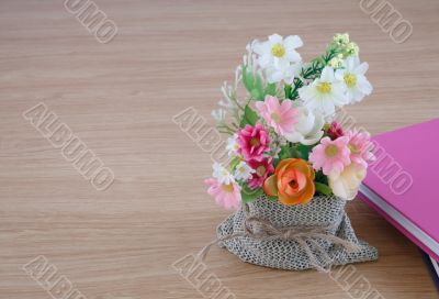 Decorative flower on wooden desk