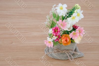 Decorative flower on wooden desk